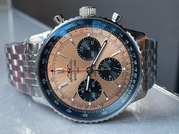 Navitimer 01 11 SS Salmon Dial on Steel Strap A7750 BLS Factory