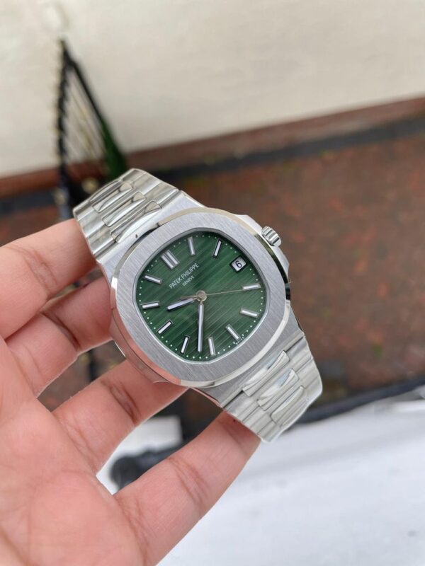 Size 40mm x 8.5mm Movement Japanese Miyota 9015 Automatic at 28800vph Decoration Functions Hours, minutes, seconds and date display Case 1:1 solid 316L stainless steel case Crystal Scratch-proof sapphire crystal with AR coating Dial Green textured dial Bezel Polished/brushed stainless steel bezel Strap 1:1 solid 316L stainless steel bracelet, the best nautilus bracelet so far Clasp Deployant clasp with deep engravings Water resistance >50 Meters